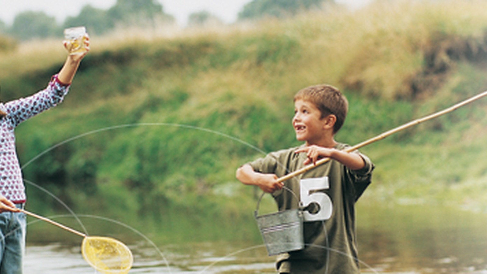 Child fishing outdoors